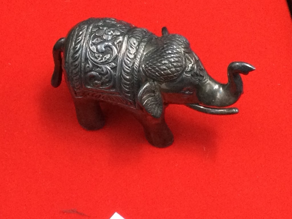 Vintage Embossed Silver Elephant: Silver India elephant that measures 2 1/4" x 4 1/4" x 1 3//4". Weighs 153.8g possibly 800 or 900?. Condition is good, see pictures. No refunds given.