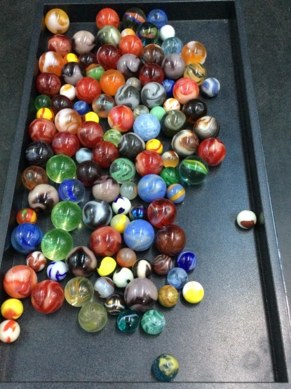 Vintage Marbles: Lot of antique marbles, most glow under the uv light. See pictures, condition is consistent on age and use. No refunds given.