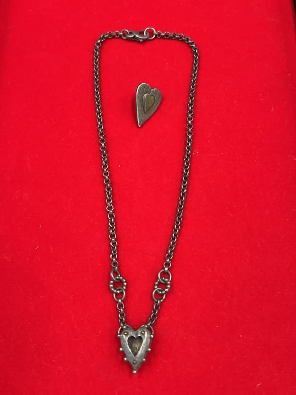 Vintage Thomas Mann Bronze Jewelry Set: Designer jewelry with pin on brooch shaped as a heart. The other piece is a chain with pendant. Both are signed see pictures. No refunds given.