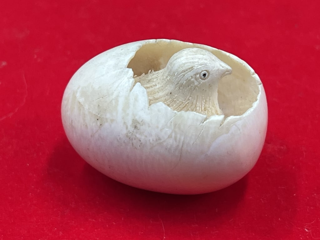 Carved Chick in Egg: Neatly carved piece with lots of detail. Measures about 1 1/4"h x 2"l. See pictures. Condition is consistent on age. No refunds given.