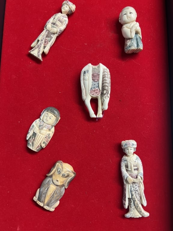 Vintage Carved Netsukes: Total of 6 in the lot. Very intricately carved pieces with scrimshaw. See pictures. Condition is good. No refunds given.