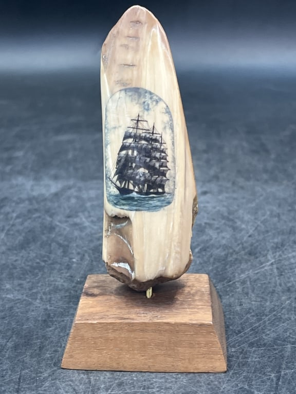Scrimshaw Fossilized Mammoth: Neat colorful scene of large sailboat on water. Signed T. Prendergast on bottom. Measures 4" w/o base and is in good condition. See pictures. No refunds given.