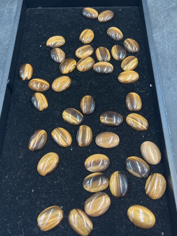 Tiger Eyes Cabochans: Neat lot of tiger eyes. They measures from 1" to 1 1/4". Approx. 30 in this lot.. Condition is consistent on age and use, see pictures. No refunds given.
