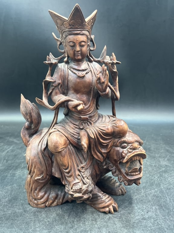 Vintage Green Tara in Tibetan Buddhism: Shows her riding a mythical creature combing elements of a unicorn and dragon. Older wood carving out of local doctors estate. Out of local Doctors Estate Deland FL. Measures 11.5"h xx 8"l x 3.5"w. Co