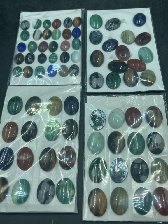 Cabochons: Total of 4 sheets of gemstones and a total 16 each sheets. There is a variety from malachite, tiger eyes, etc. See pictures. Conditions is good, no refunds given.