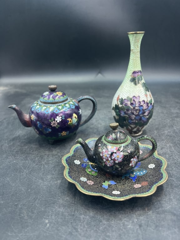 Vintage Japanese Cloisonne: Total of 4 pieces in this lot. One is a white vase with purple flowers 6 1/4". The other pieces are purple tea pots and one small plate (4 3/4"). They 2.5" and 4" . Out of local doctors estate Deland 