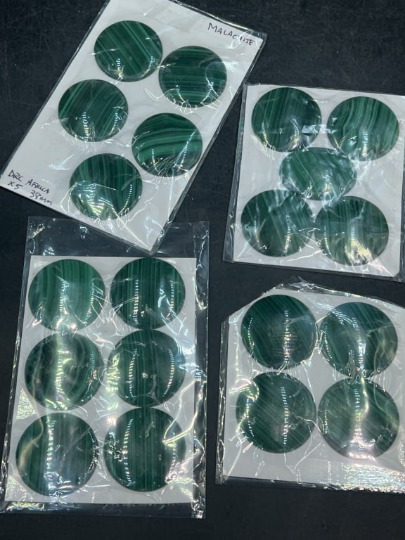 Malachite Cabochans: Total of 4 sleeves of malachite cabochans. Measures 1.473". Condition is good, see pictures. No refunds given.