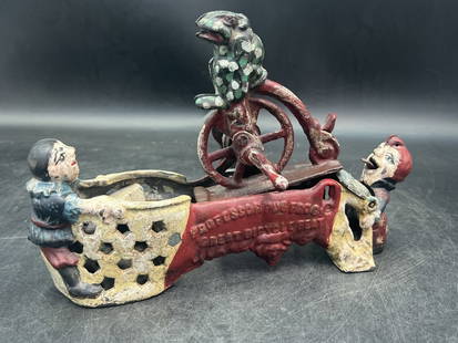 Vintage Cast Iron Mechanical Bank: Professor Pug Frogs Great Bicycle Feat Cast Iron Bank. Dated on bottom, see pictures. Condition is consistent on age and use, some paint loss. Not a reproduction piece. No refunds given.