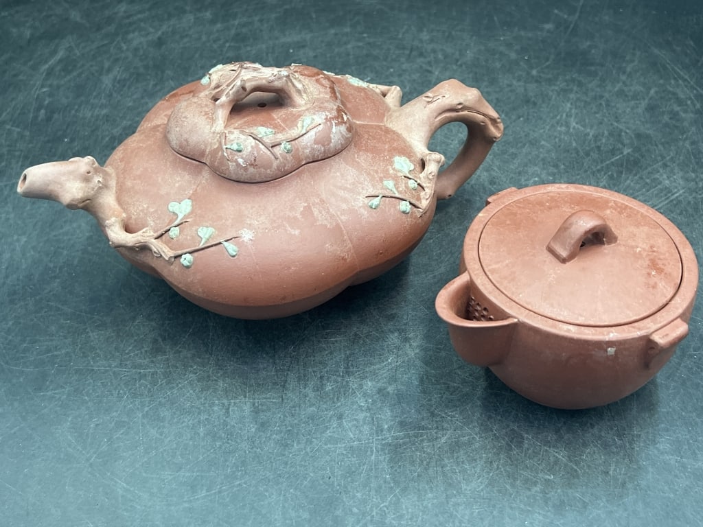 Vintage Asian Colored Clay Teapots: One is a YuFang Chinese Yixing Teapot 5 lobed mellon form prunus blossom handle 5 lobe compressed mellon decorated with prunus branch spout and marked inside lid. The other teapot is signed on the bot
