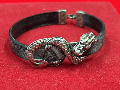 John Hardy Legend Naga Dragon: Sterling silver with leather strap bracelet. See markers mark this is a older piece made by John Hardy. Marked also 925. Condition is good for age and use, see pictures. No refunds given.