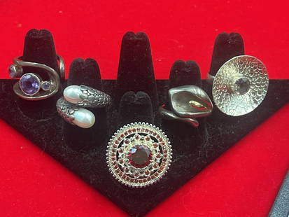 Sterling Rings: Total of 5 big beautiful silver rings in this lot. Art Nouveau rings that are sizes 7.5 to 9. Total weighs is 52.8. Condition is good, see pictures. No refunds given.