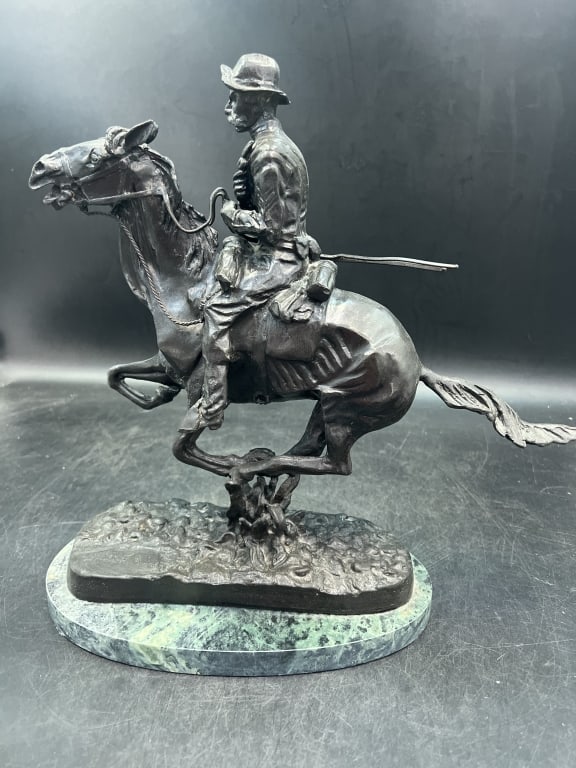 Frederick Remington 'Trooper of the Plains': Signed on bronze and mounted on granite base. Measures overall 14" x 13.5". Condition is good, see pictures. No refunds given. Third party shipping.