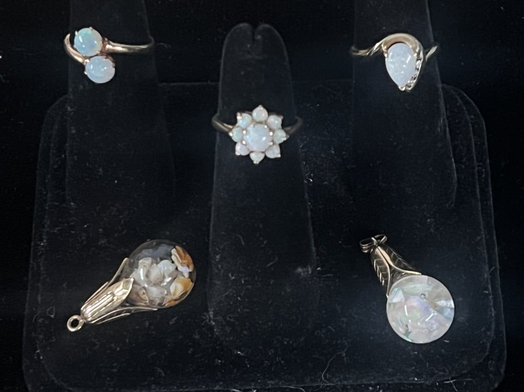 Vintage Opal and Gold Jewelry: There is 3 rings in this lot. They are sizes 6 and 6 1/2. the other 2 items are pendants with gold and opal inside. Total weight of all is 14.6g. See pictures. Condition is good. No refunds given.