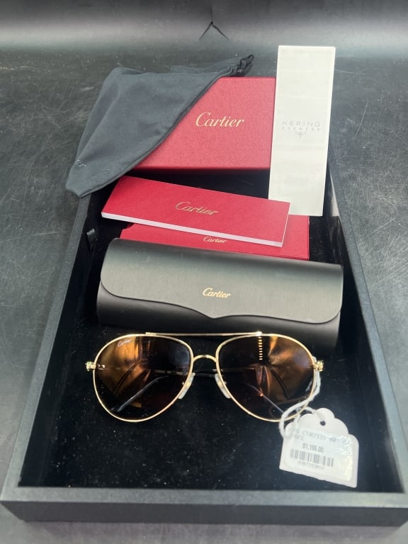 Cartier Sunglasses 'Santos de Cartier Pilot Style: CT 02338 001. Comes in original box, case, cleaning cloth, paperwork and store tag. Signature screw details. Made in Italy and condition is new, see pictures. No refunds given.