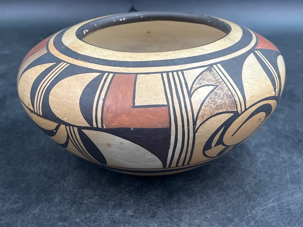 Antique Paqua Nahan Hopi Polychrome Pottery: Artist Paqua Naha (Frog Woman). Traditionally fired Hopi yellow ware pottery. Inscribed on the bottom and circa 1945. Measures about 4"h x 7"l. From world traveler estate. Condition is consistent with
