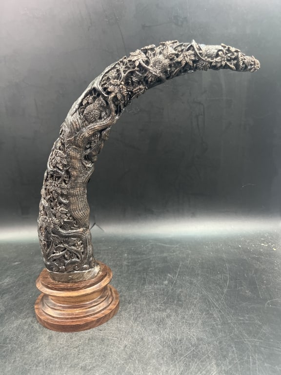 Vintage Large Carved Horn: Very intricately carved piece possibly water buffalo. Measures about 18" and is on a stand. Stand is missing pin on stand. Condition is consistent with age and use, see pictures. No refunds given.