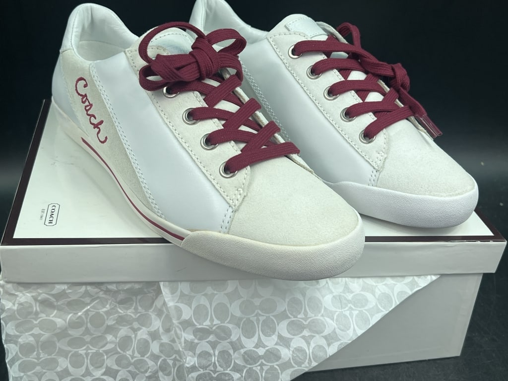 Coach Malli Sneakers 'New': Comes in original box. White leather and red laces. Size 9 and condition is new. See pictures. No refunds given.