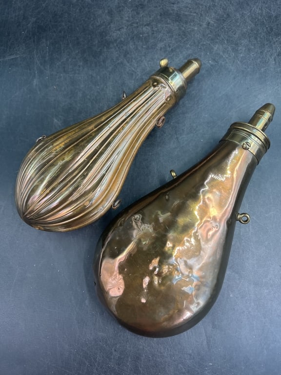 Antique Civil War Brass Powder Flasks: These were used to carry and dispense gunpowder for muzzle loading firearms. Size of flask indicate the type of firearms intended for. They measures about 8.5" each. Condition is consistent with age a