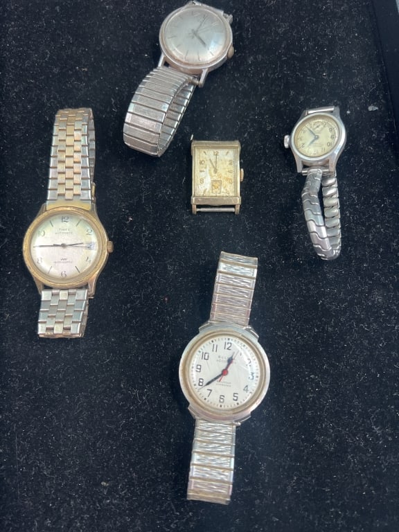 Watch Lot: There is 4 watches and 1 Elgin watch face. There is 2 Timex watches, 1 Bolova Accutron and record watersport. Condition is consistent with age and use, see pictures. No refunds given.