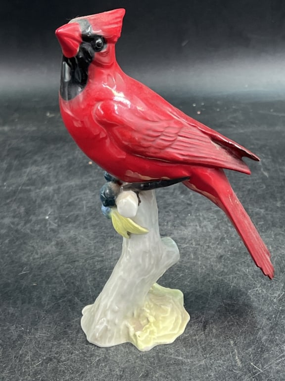 Hutschenreuther Porcelain Cardinal Figurine: Figure depicts a male Northern Cardinal known for its vibrant red plumage and black mask. Vintage item from mid 20th century. Condition appears to be good. Measures 7'. No refunds given.