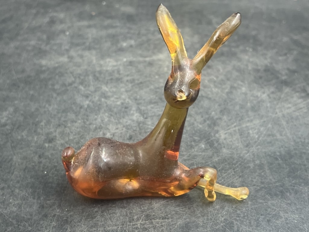 Vintage Hand Blown Glass Animal Figurine: Made of clear and amber colored blown glass. Material has a glossy finish and some internal variations in color and patter. Condition appears good, see pictures. measures 4 1/4" x 4 1/2'. No