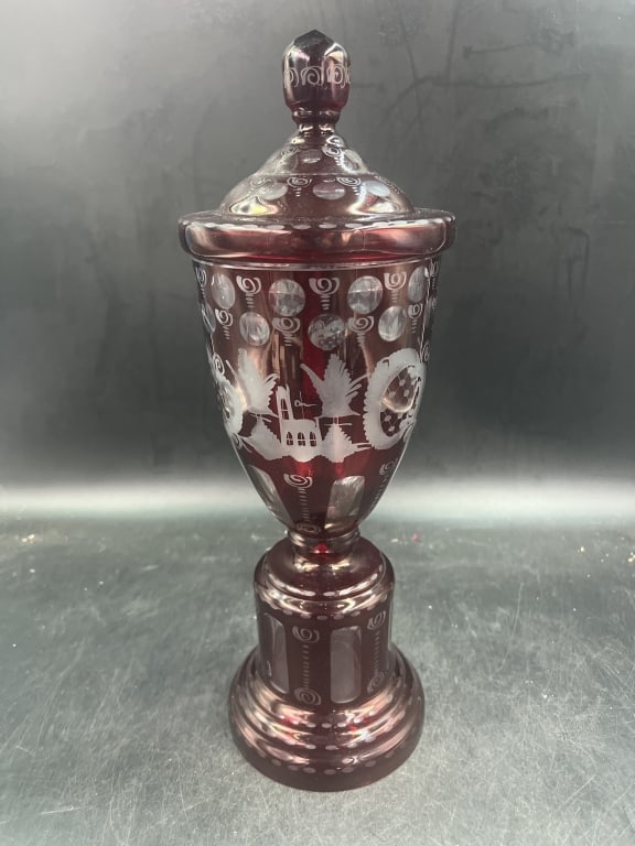 Ruby Bohemian Cut to Clear Urn: Hand Etched decor. Measures 15" h and opening is 4 3/4". No chips or cracks, see pictures. No refunds given.Condition Information: It is the responsibility of the buyer to obtain all possible
