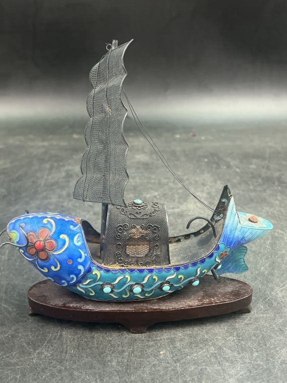 Vintage Chinese Silver and Enamel Junk Ship: Neat piece with silver Filigree . Blue cloisonne around the body on a raised teakwood base. Measures about 6 1/2"h x 6 1/4. See pictures, condition is consistent with age and use. No refunds