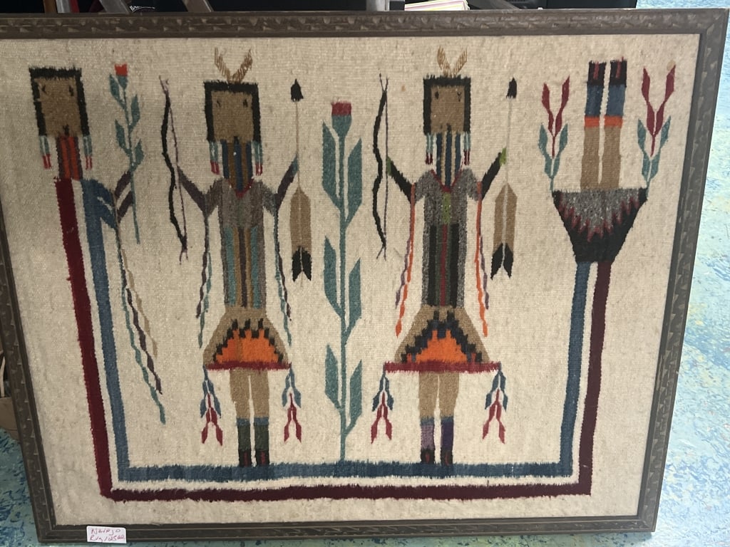 Navajo Yei Woven Rug: Rug features benevolent supernatural beings from Navajo healing ceremonies. Design includes central figures are flanked by cornstalks, feathers and arrows surrounded on three sides by a "Rainbow