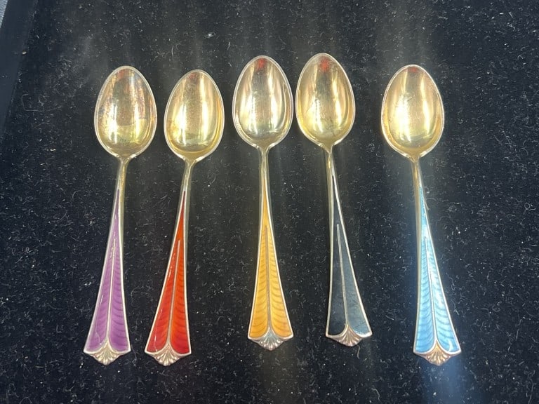 David Andersen Norwegian SS Demitasse Spoons: Featuring gulloche enamel stems and gold wash. Designer David Andersen, Norway. Sterling Silver with gilding and enamel. Weighs 43.5g and condition is consistent with age and use. No refunds