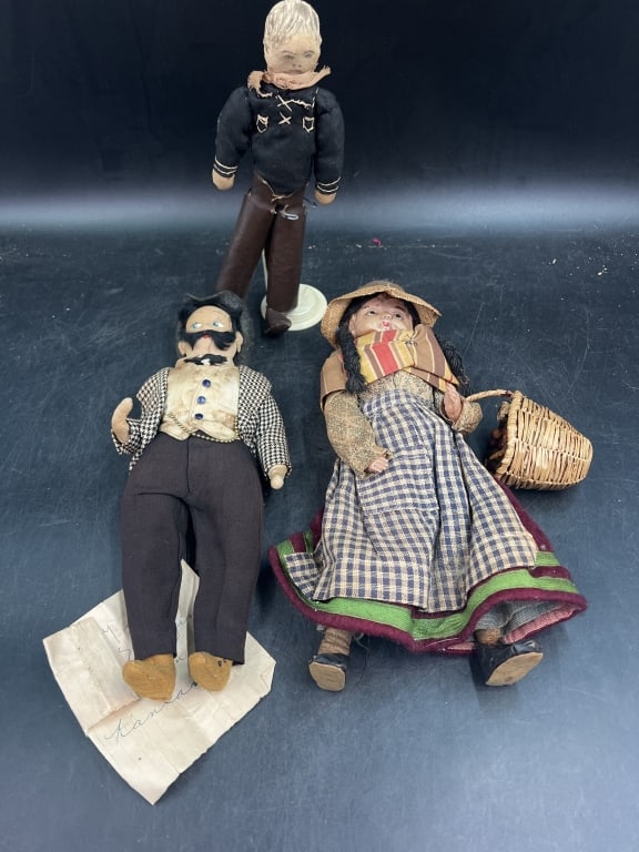 Vintage Handmade Dolls: Dressed in traditional style clothing. Total of 3 dolls. There is one lady holding a basket (11.5"), the next is a man dressed up (11") and lastly the last one has tag from NM 1945 of man in