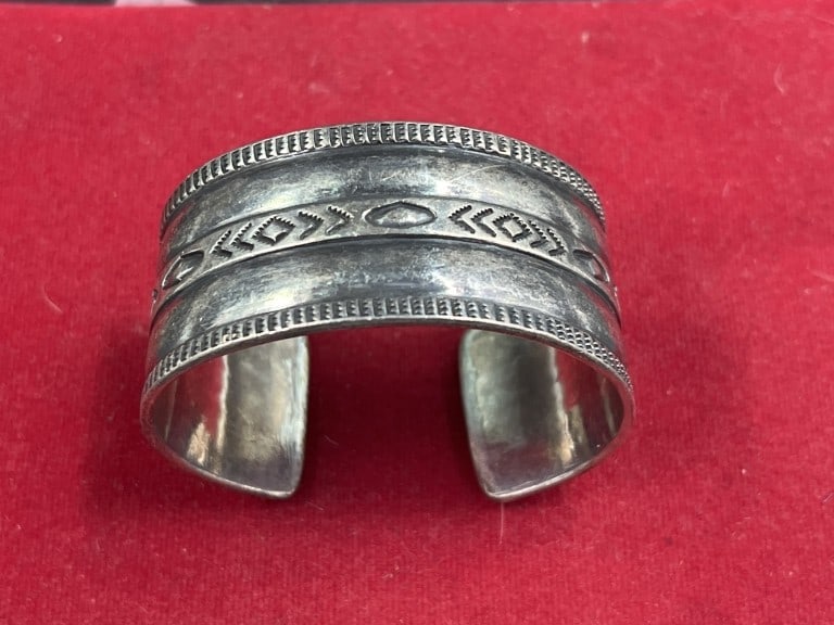 Large Sterling Cuff Braclet: Very heavy sterling cuff that weighs 79.5g and measures about 2 1/4"w x 6". Condition is good, see pictures. No refunds given.Condition Information: It is the responsibility of the buyer to