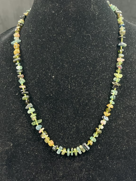 Vintage Asian Necklace: Has water tourmaline, green tourmaline, etc. Necklace has Asian sterling clasp. See pictures, this is a beauty. Condition is good. No refunds given.Condition Information: It is the