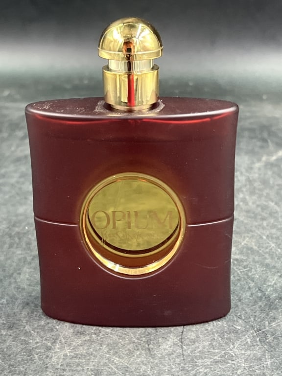Opium Yes St Laurent Perfume: #38W702D 3 fl oz bottle. Very little out of this bottle see pictures. No refunds given.Condition Information: It is the responsibility of the buyer to obtain all possible information prior to