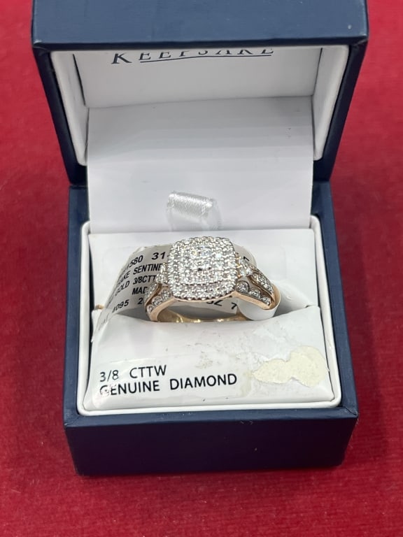 10kt Gold Diamond Ring: Brand new ring. 3/8 CTTW genuine diamond. Ring is size 7.5. Condition is new, see pictures. No refunds given.Condition Information: It is the responsibility of the buyer to obtain all possible