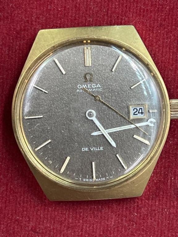 Vintage Omega Automatice De Ville Watch: Nice watch with no band, needs hands replaced . Marked on back and black dial. Condition is consistent with age and use, see pictures. No refunds given.Condition Information: It is the