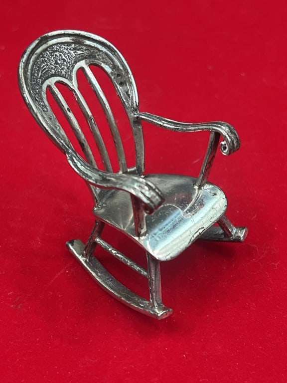 Vintage Miniature Rocking Chair Sterling: Marked on the bottom and often used as a collectible figure or dollhouse accessory. Measures 2.5"h and weighs 48.0g. Condition is consistent on age and use, see pictures. No refunds