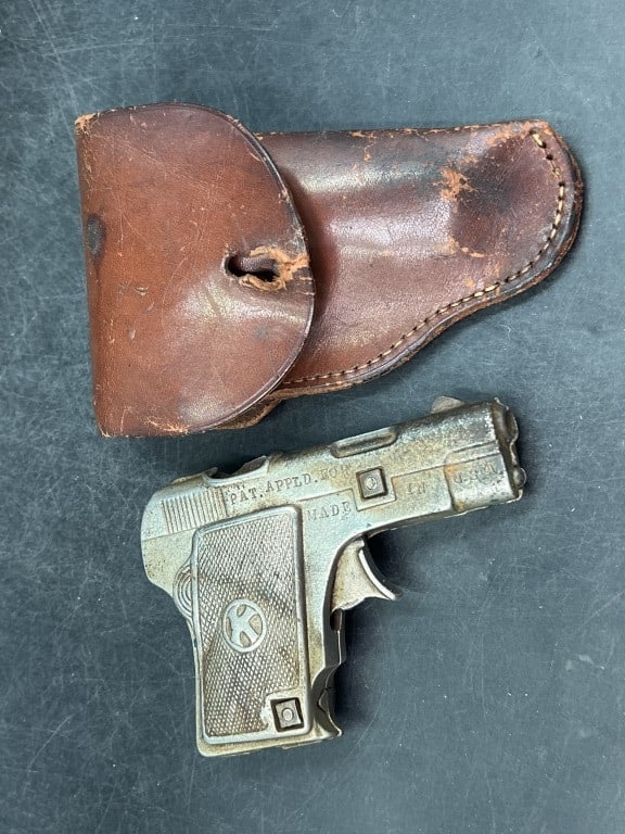 Kilgore Border Patrol Cap Gun 1935: Cap Gun comes with leather holder. Nickel plate cast iron Made in USA. Condition is consistent with age and use, see pictures. No refunds given.Condition Information: It is the responsibility