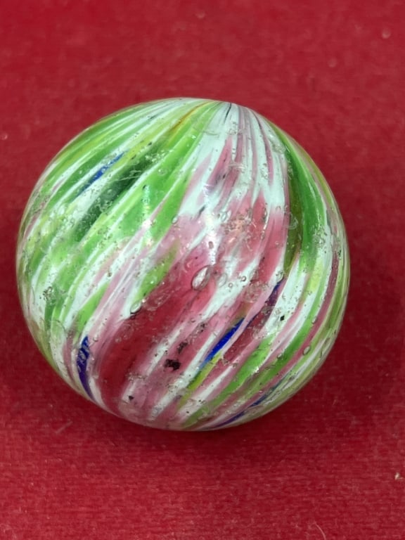 Vintage German 'Onion Skin' Marble: Dating from 1860-1920. Features multicolored core wrapped in a opaque white, pink and green outer layer. Measures 1.796". Condition is consistent with age, see pictures. No refunds