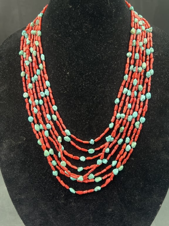 Vintage Multi Strand Coral and Turquoise Necklace: Exquisite piece that crafted by artisans at Kewa Pueblo . Stunning turquoise and coral with silver clasp. Condition is good, see pictures. No refunds given.Condition Information: It is the responsibil