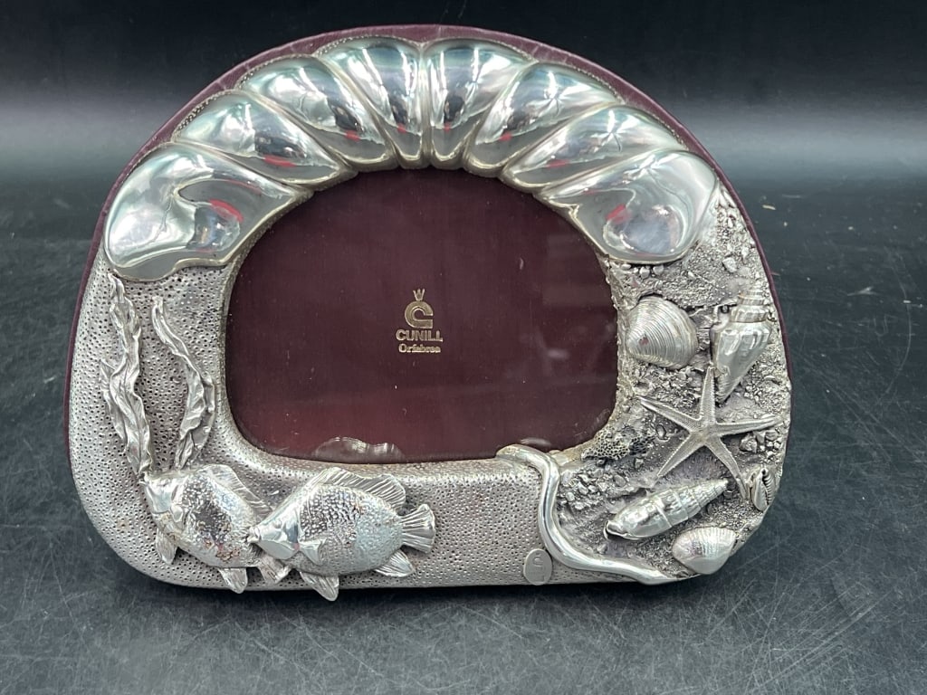 Cunill Silver Phone Frame 'Nautical': Spanish luxury brand frame. See pictures for marks and condition. Appears good. Nice nautical themed designed crafted in sterling silver. Measures overall 6.5" x 7 3"Condition Information: It is the r