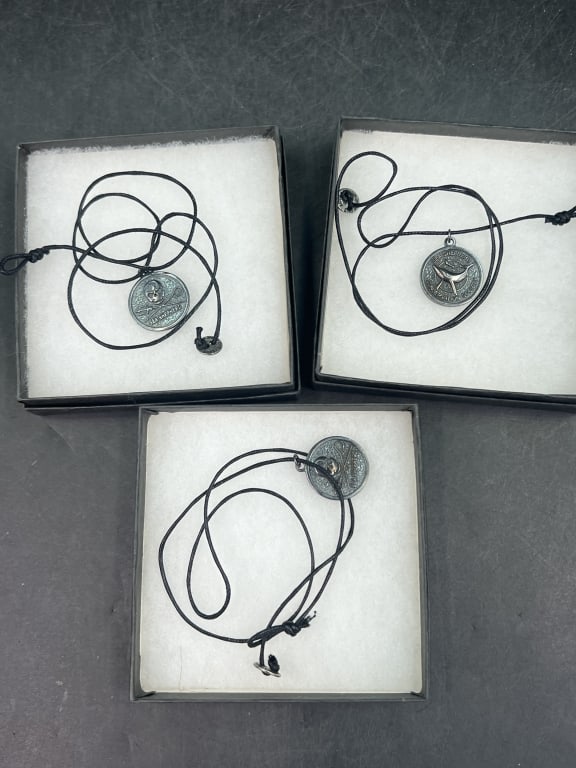 Sea Shepherd Conservation Necklaces: Total of 3 sterling silver pendents in original boxes. Condition is consistent with age and use, appears good not used. See pictures. No refunds given.Condition Information: It is the