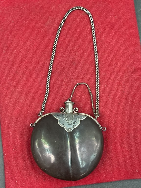Early Flask Snuff or Perfume: Crafted from ox horn with decorative sterling silver mounts. Used to hold items often hung from chatelaine or served as pendant. Late 19th to early 20th century early Navajo silversmiths. 