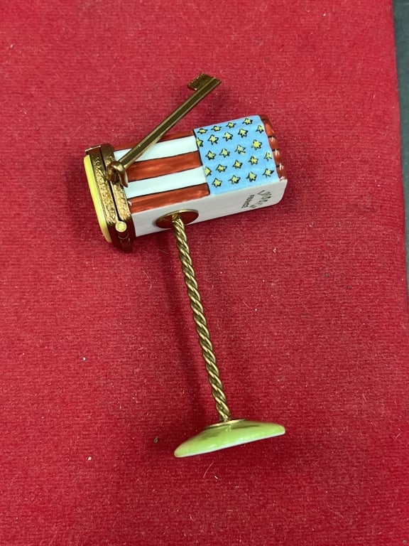 Limoge Trinket Box: Peint Main hand painted trinket box designed as a miniature American Flag mailbox, signed on bottom. Handcrafted porcelain. Condition is good, see pictures. No refunds given.Condition