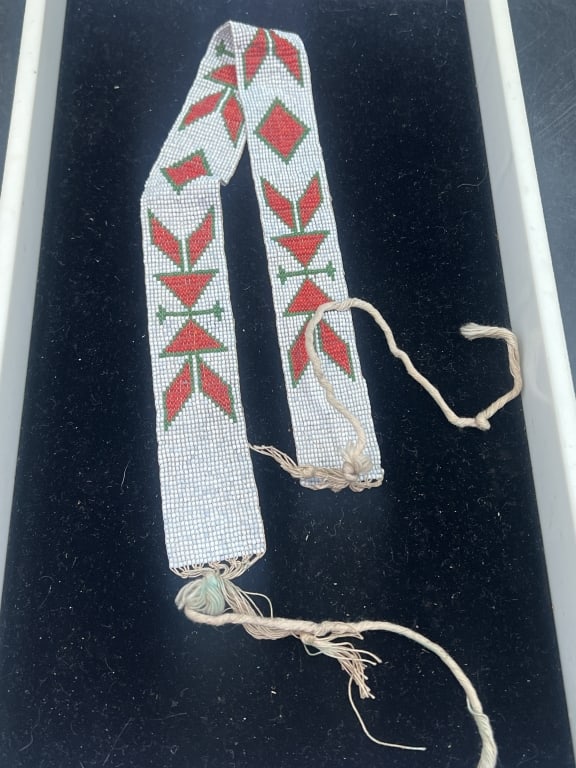 Vintage Native America Sash: Beautiful loom beaded sash featuring traditional color palette. Seed beads in white, red, green and condition is consistent with age and use, appears good. Beaded parts measures 19". See pictures. NoC