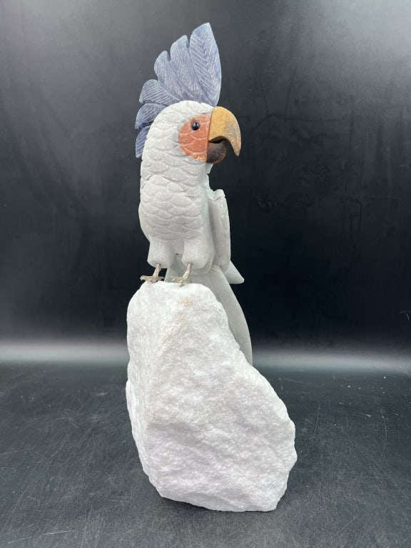 Gemstone Cockatoo on Gemstone Base 'Large': Handcrafted Cockatoo with purple and blue crystal carvings. 100" natural quartz crystal rock. Measures overall base and Cockatoo 27". Stunning piece that condition is good, see pictures. No refunds gi