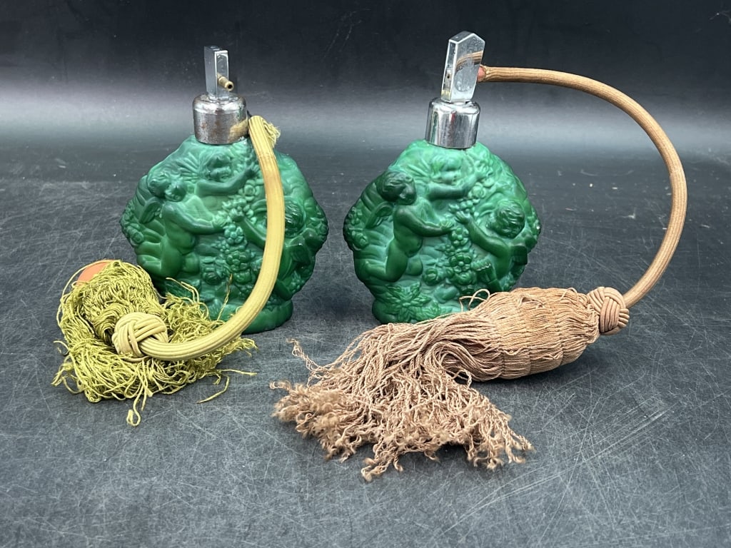 Vintage Art Deco Malachite Perfume Bottle: Set of 2 malachite bottles in this lot. From Czechoslovakia circa 1930's. Opaque queen malachite glass featuring a satined hand polished finish. Bottle depict raised figural scenes of cherubs
