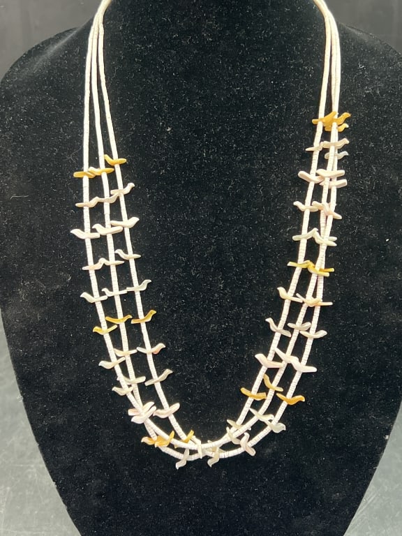 Multi Strand Fetish Necklace with Sterling Clasp: Nice piece separated by small heishi beads. Navajo made and condition is good, see pictures. Measures about 24". No refunds given.Condition Information: It is the responsibility of the buyer