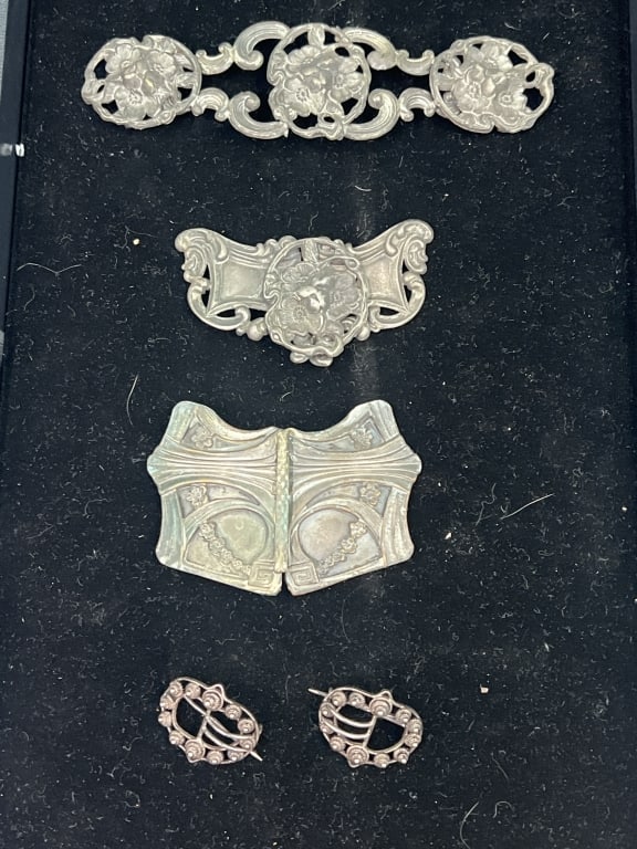 Vintage Art Nouveau Silver Items: Total of 7 pieces, but 3 are pairs. Decorative metal pieces for belts, sash buckle components. Also one set is brooches. See pictures, Condition is consistent on age and use. Nor refunds given.Conditi
