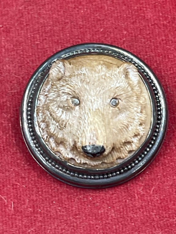 Sterling Carved Bear Pendant/Brooch: Neat piece that Bear is carved and set in sterling. Measures 1.5" and condition is good, see pictures. No refunds given.Condition Information: It is the responsibility of the buyer to obtain all