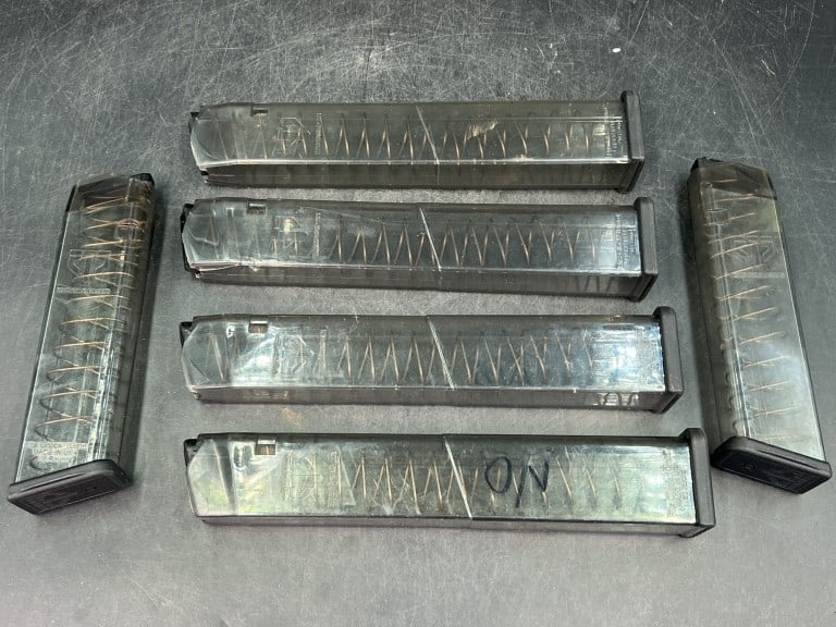 Glock Magazines: Total of 6 in this lock. Impact resistant translucent polymer construction for visual round. Designed to fit various Glock pistol models. Condition is consistent with age and use, see